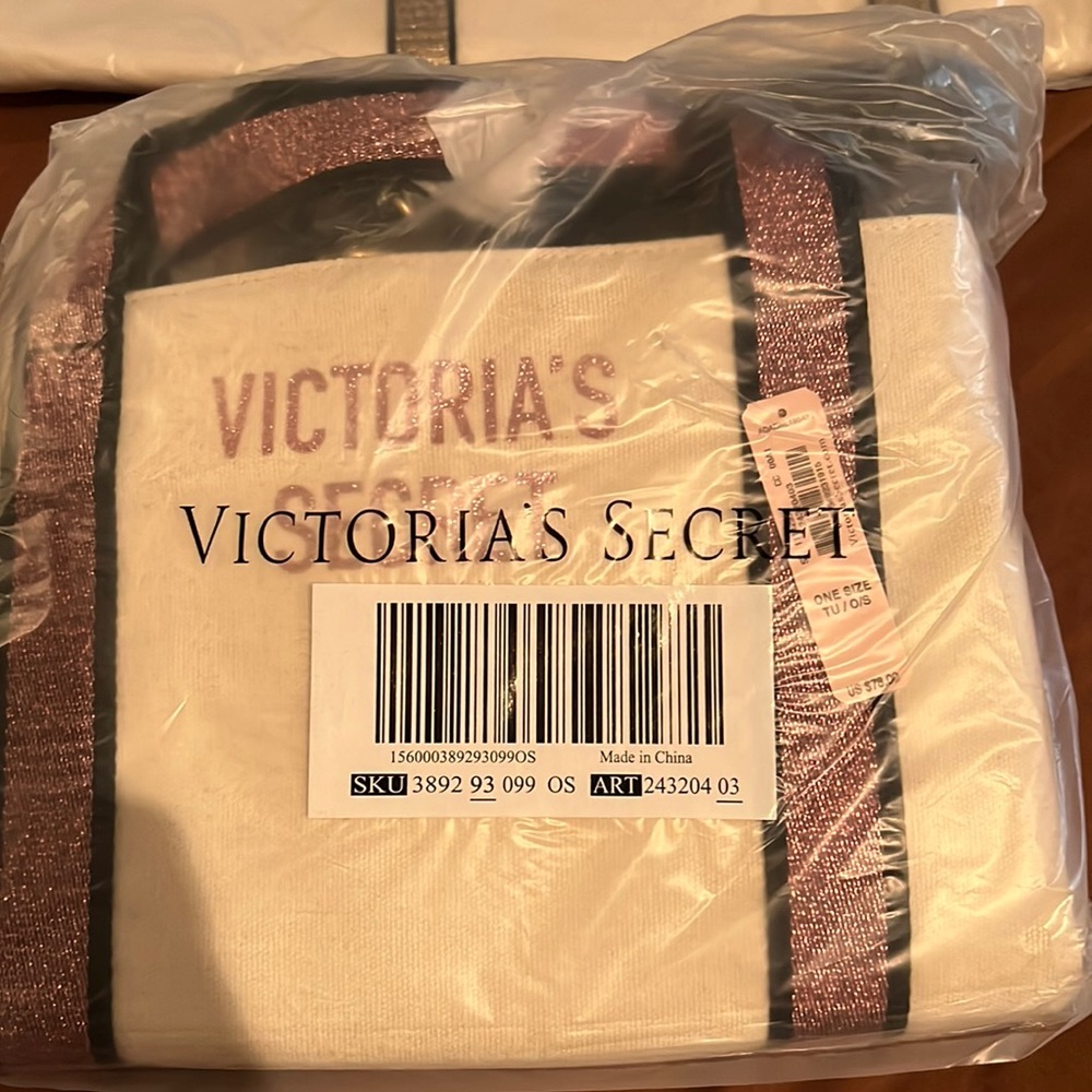 Selling two different types of bags I got a cream bag with pink handles